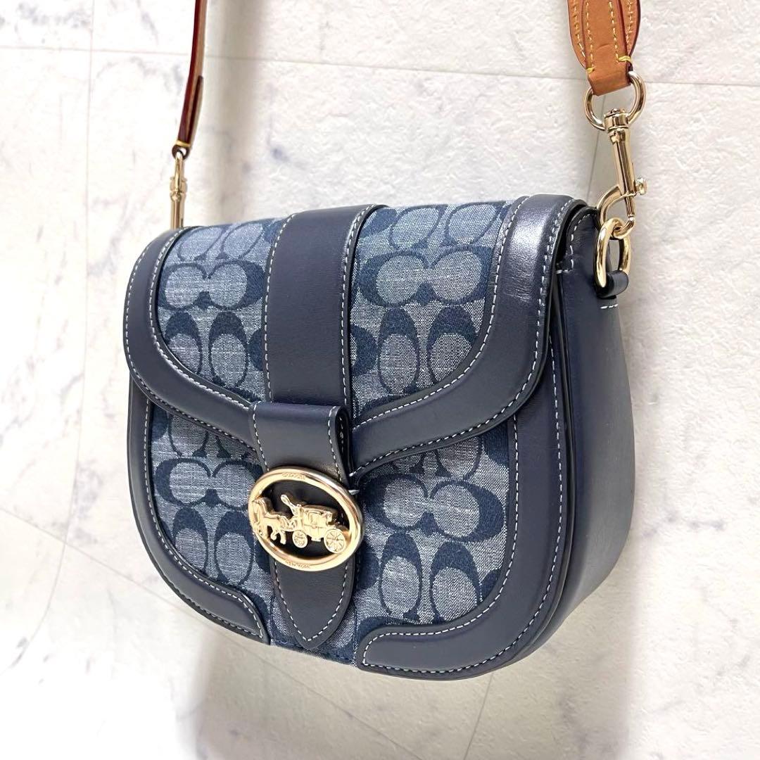 マイメロ✨コーチ ショルダーバッグ ジョージー サドルバッグ シグネチャー