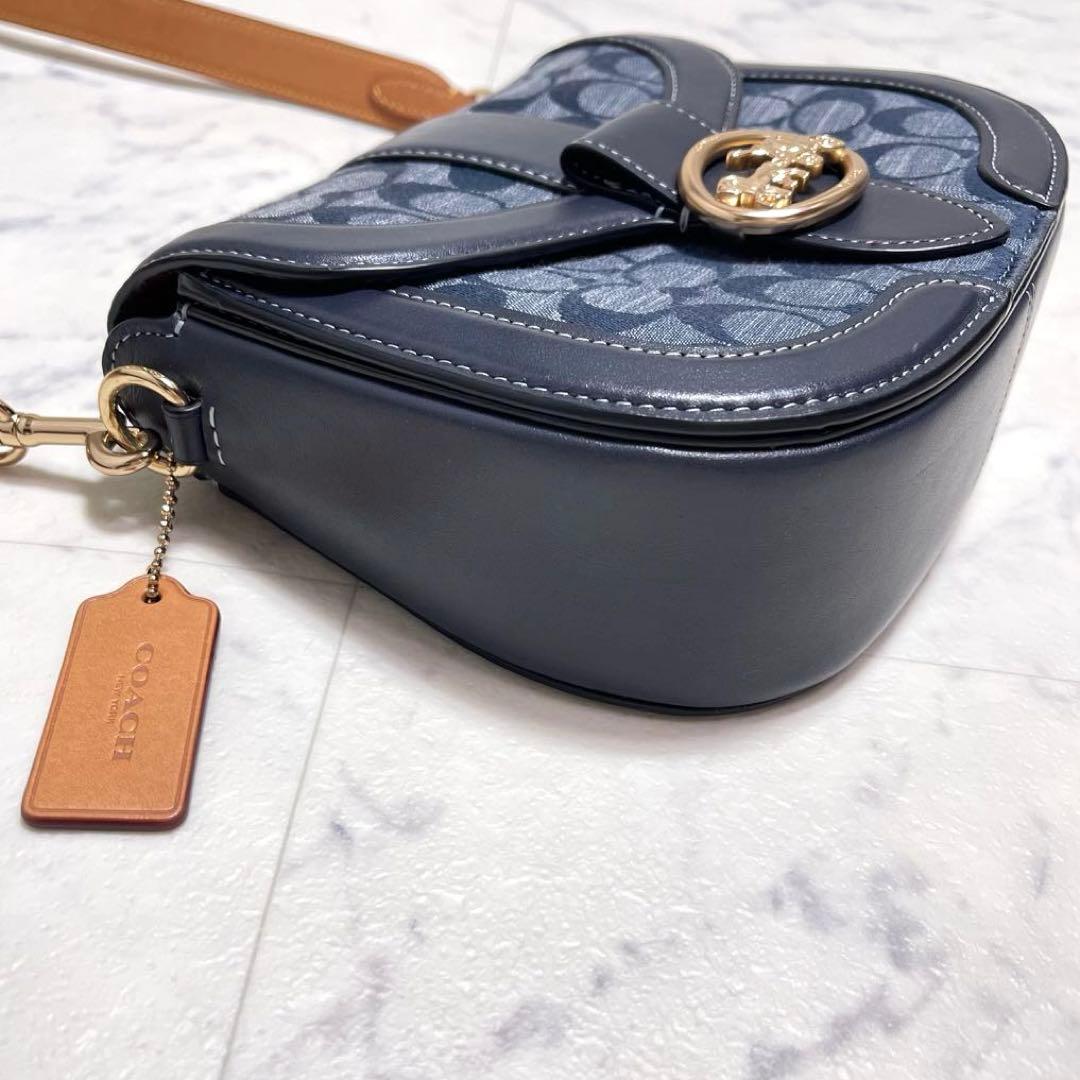 マイメロ✨コーチ ショルダーバッグ ジョージー サドルバッグ シグネチャー