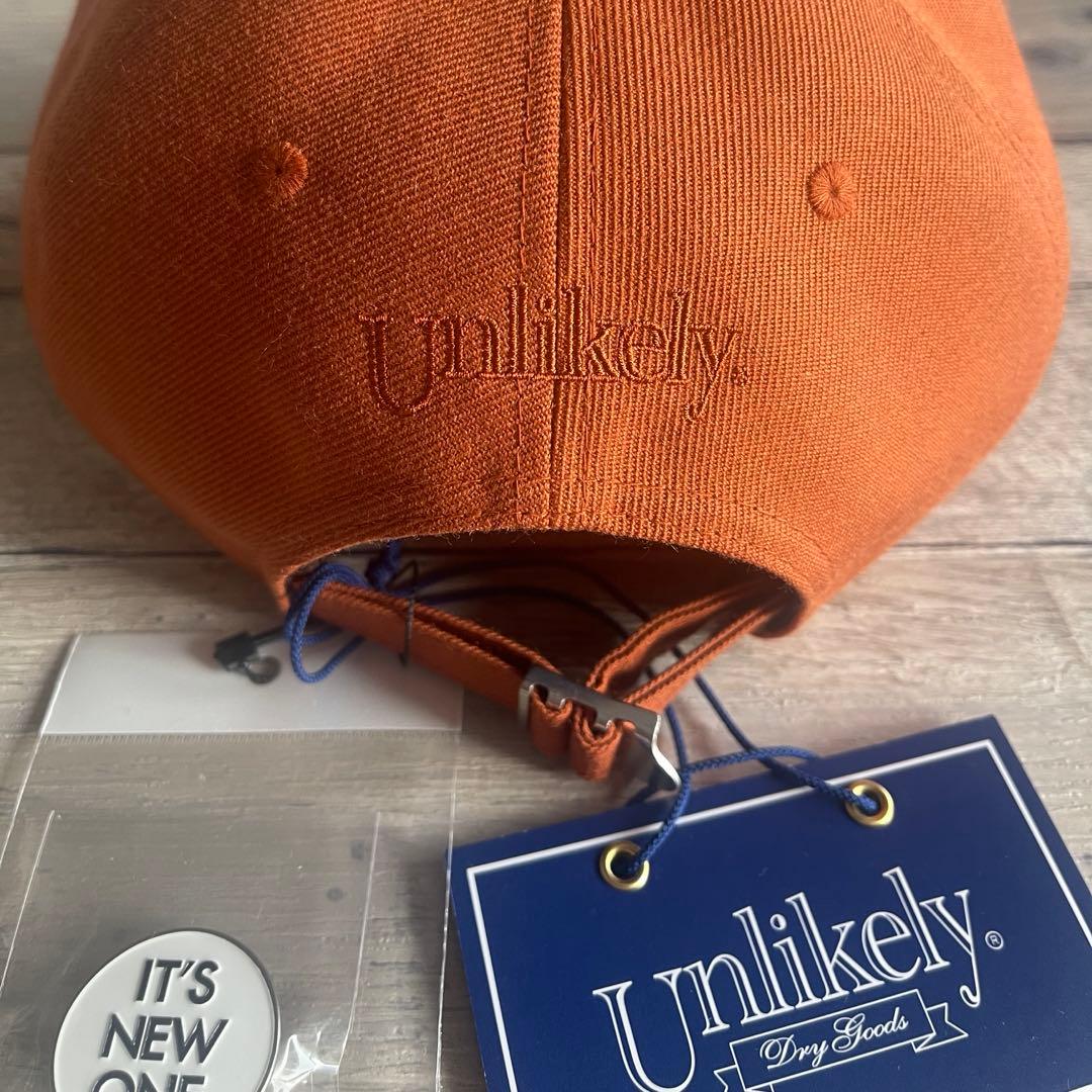 Unlikely Team Capアンライクリー26SSキャップ オレンジ帽子