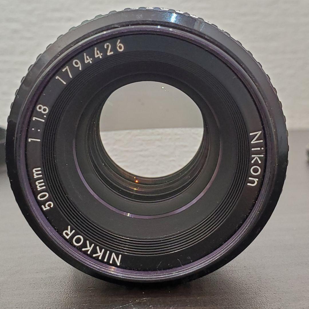 Nikon EM + NIKKOR 50mm F1.8 Ai ストラップ付