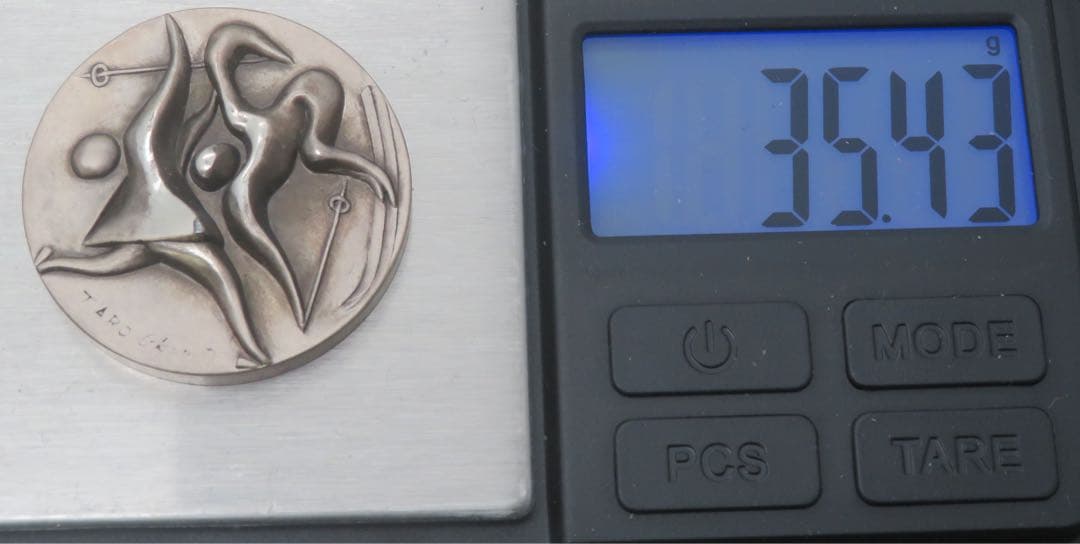 792、札幌オリンピック　純銀　刻印　メダル　岡本太郎　約35.43g