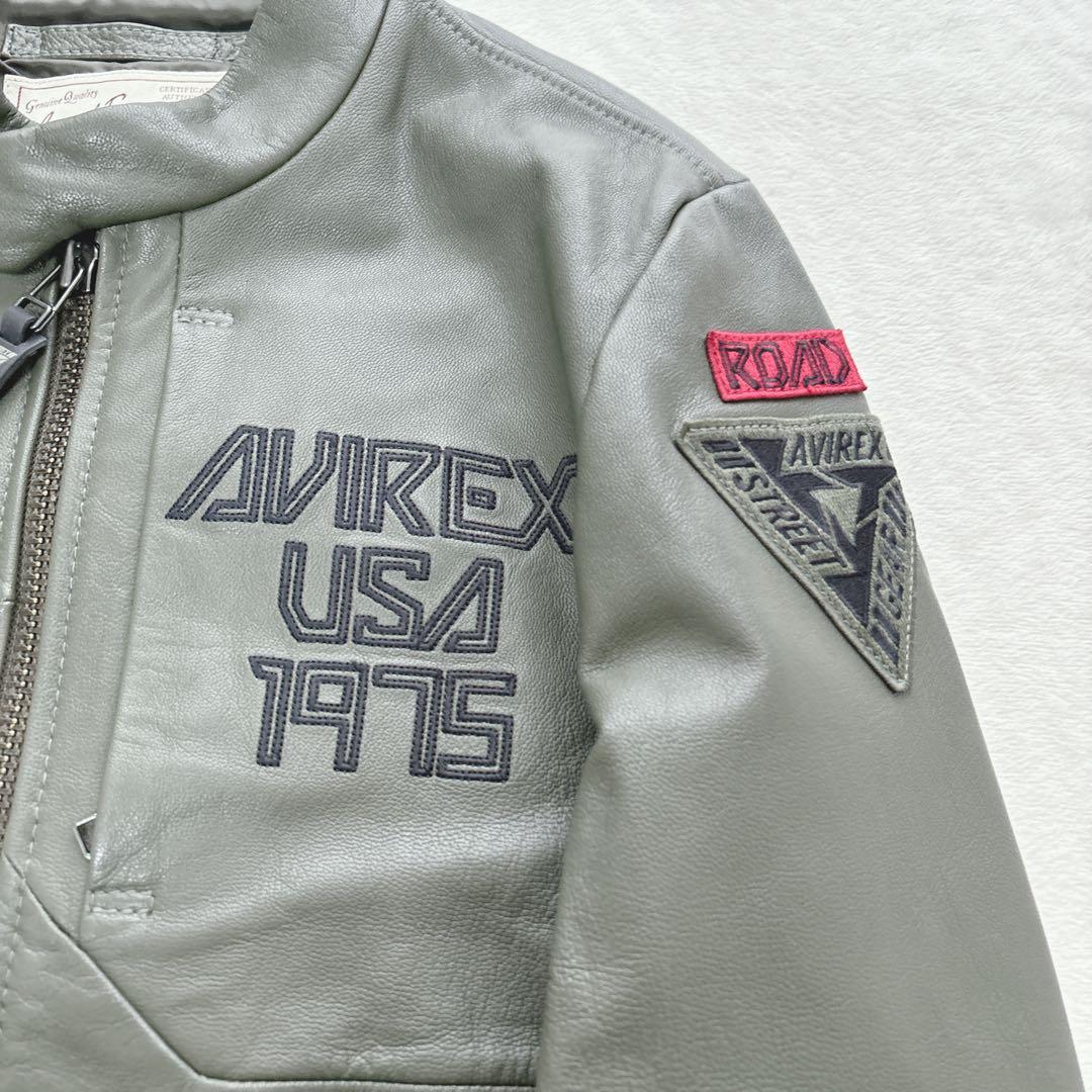 【美品】アヴィレックス　レザージャケット　カーキ　刺繍　ロゴ　やぎ革　ライダース