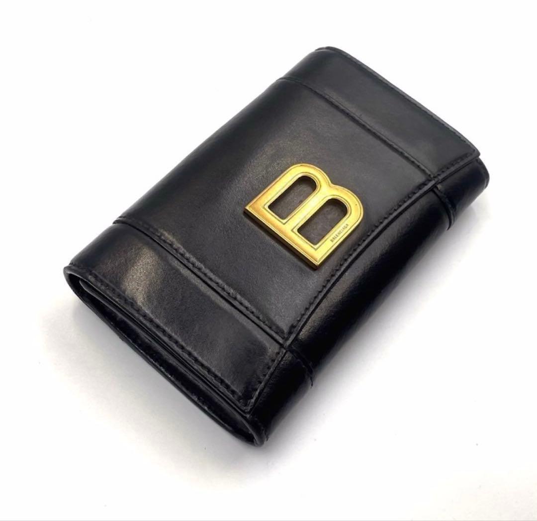 《超美品》バレンシアガ 二つ折り財布 ロゴ金具 本革 レザー ゴールド金具 黒系