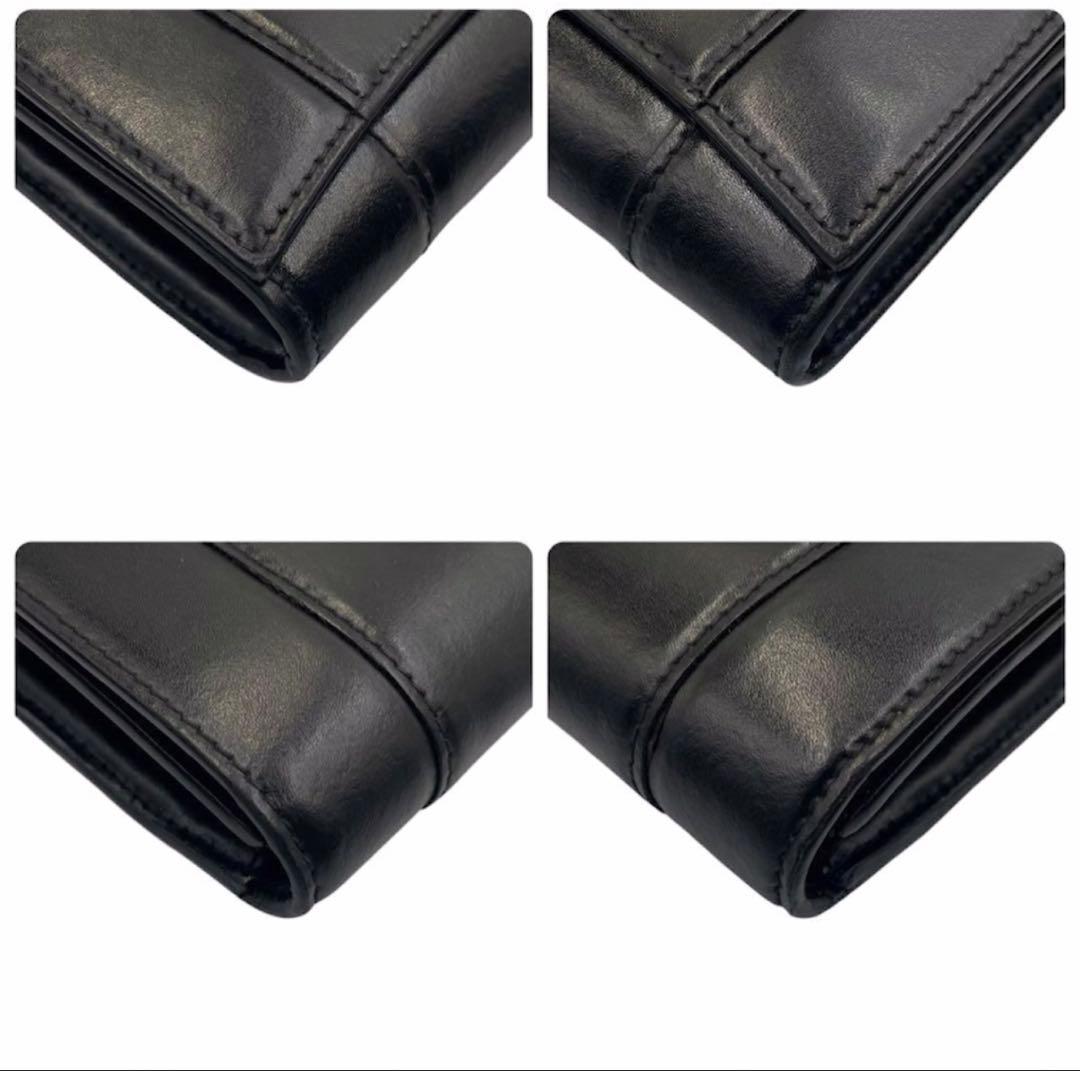 《超美品》バレンシアガ 二つ折り財布 ロゴ金具 本革 レザー ゴールド金具 黒系