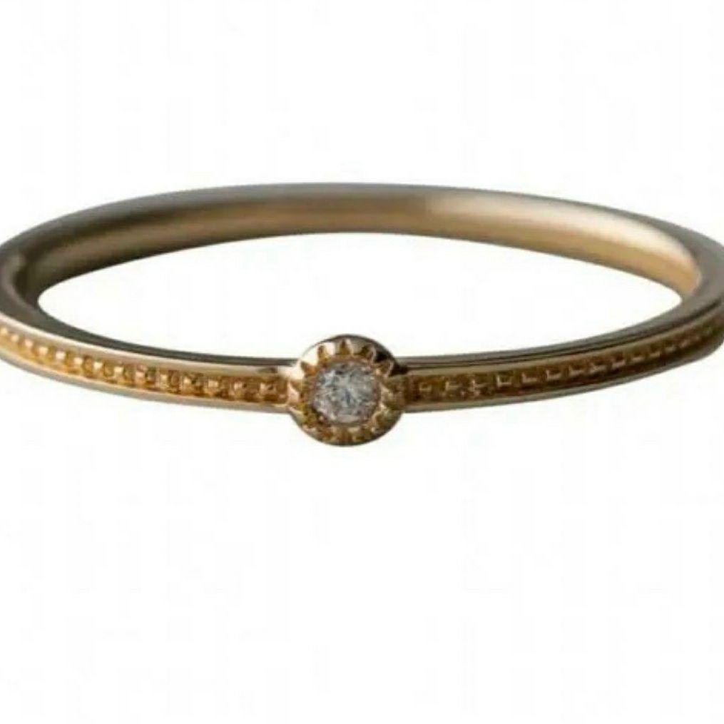 エテ K10YG レイヤード ミル打ち 1粒ダイヤモンド リング