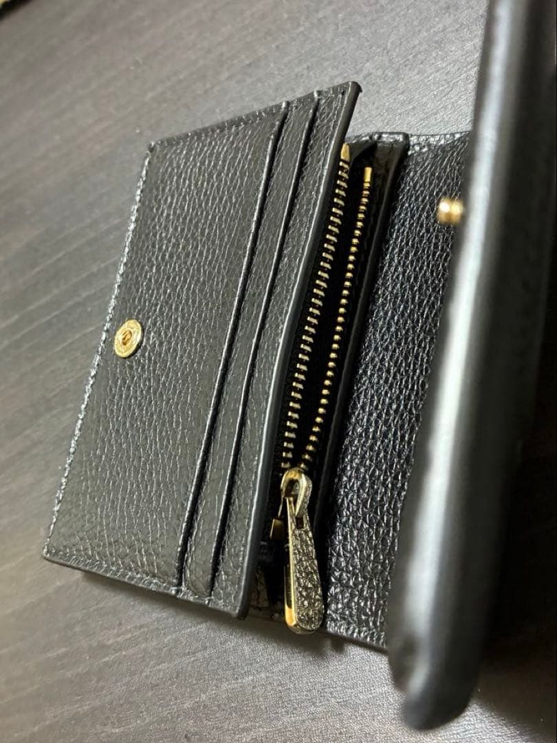 【FERRAGAMO】二つ折り財布 ガンチョシティ フェラガモ