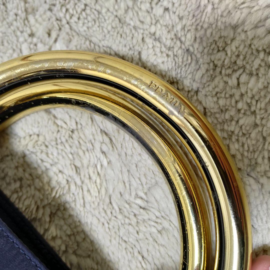 PRADA トライアングルロゴ ミニハンドバッグ ブラック ゴールド