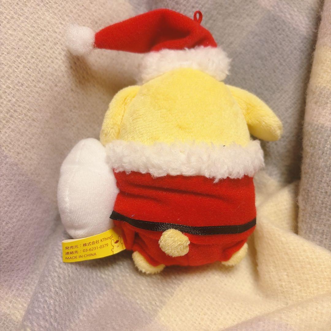 ポムポムプリンカフェ　マスコット　プレゼント持ったサンタ