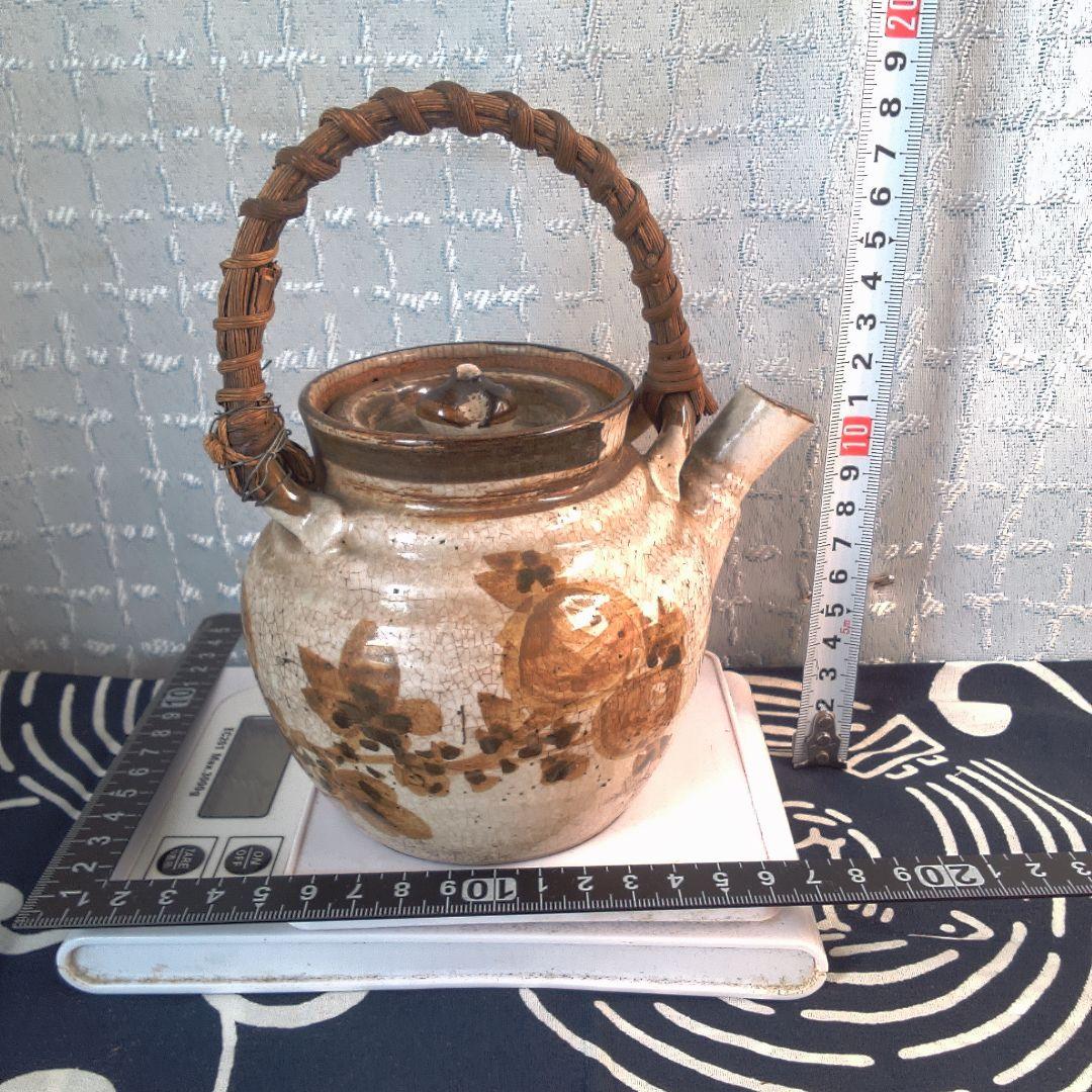 骨董２手作り陶器急須 籐ハンドル付き 水漏れあります