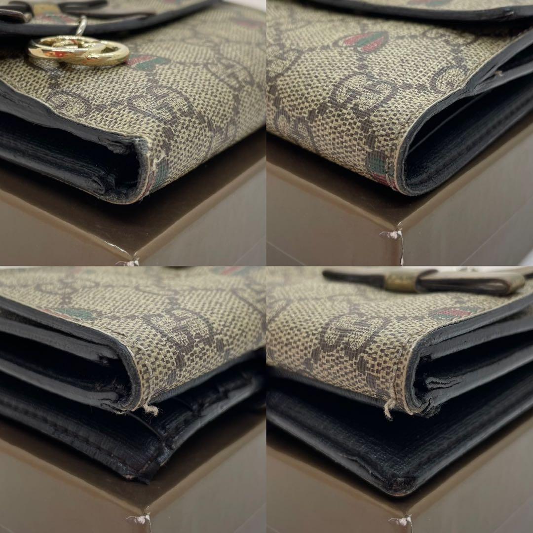 【美品/付属品完備】グッチ 二つ折り財布 小銭 GGシマ リボン ロゴチャーム