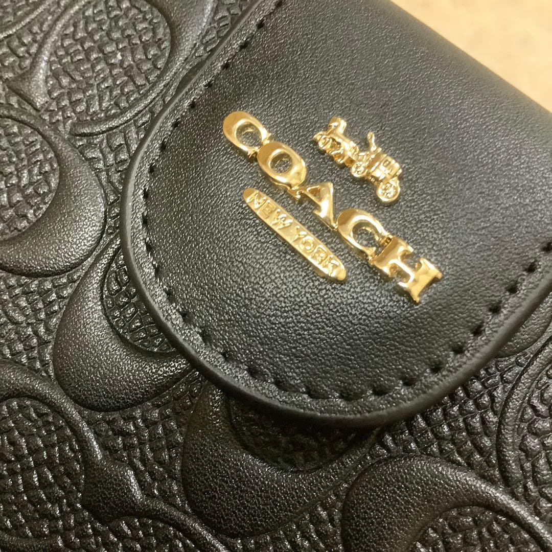 【未使用品】COACH 黒 レザー 二つ折り財布