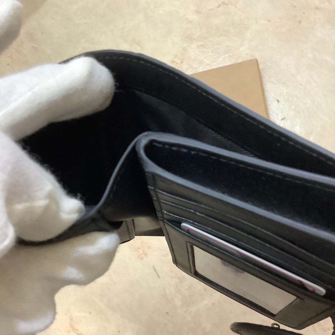【未使用品】COACH 黒 レザー 二つ折り財布