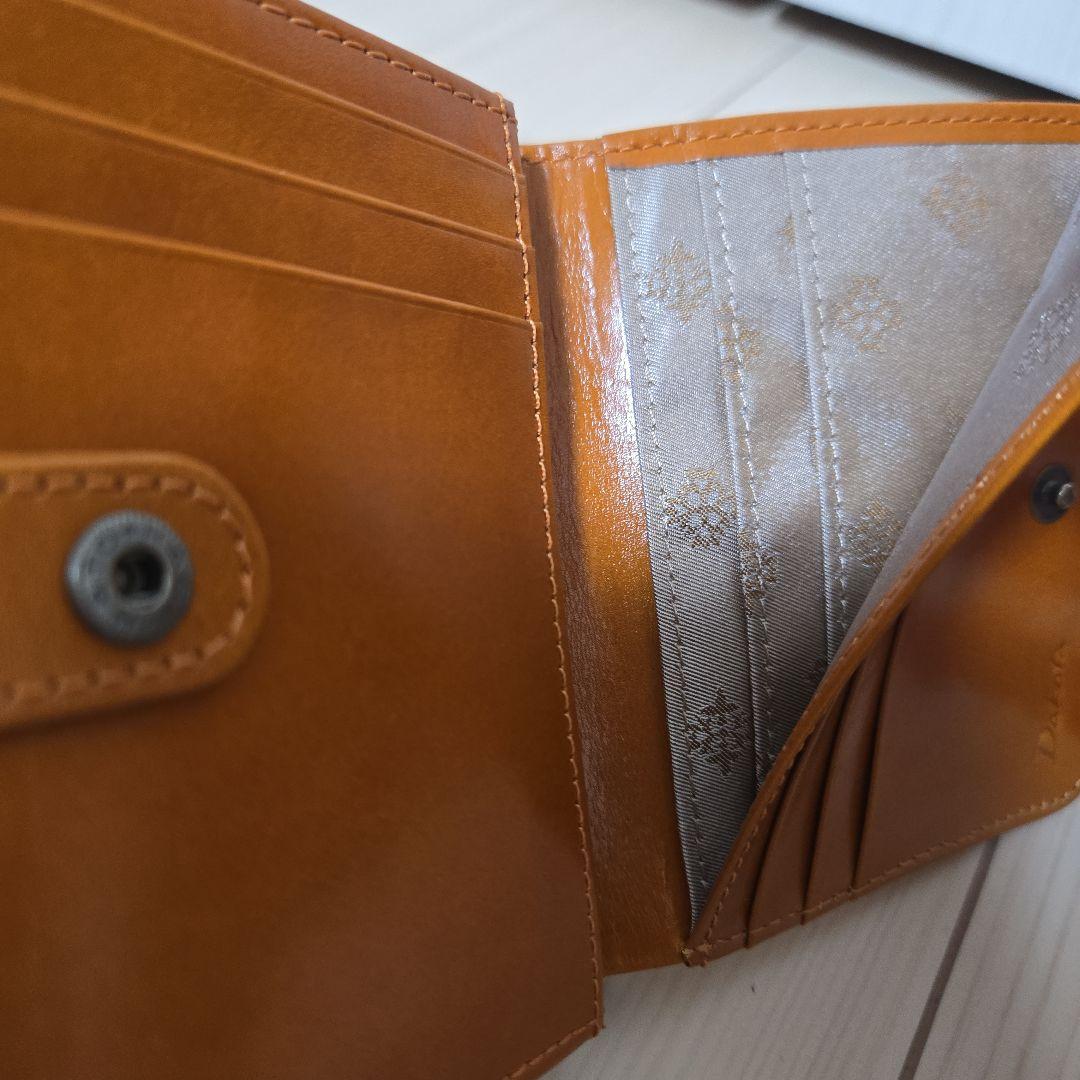 わんぴ　Dakota　メッシュ編み込み　アロマティコシリーズ　がま口折財布