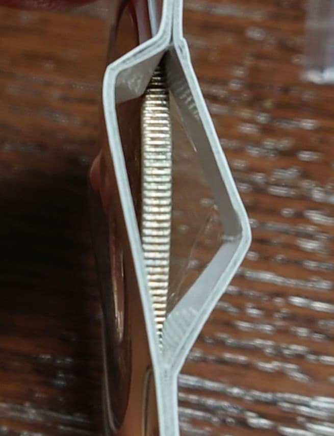 ②　一圓銀貨　明治11年浅彫り　右丸銀打ち