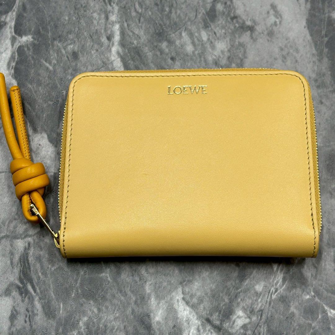 あらいぐま✨LOEWE ノット コンパクトウォレット イエローベージュ 財