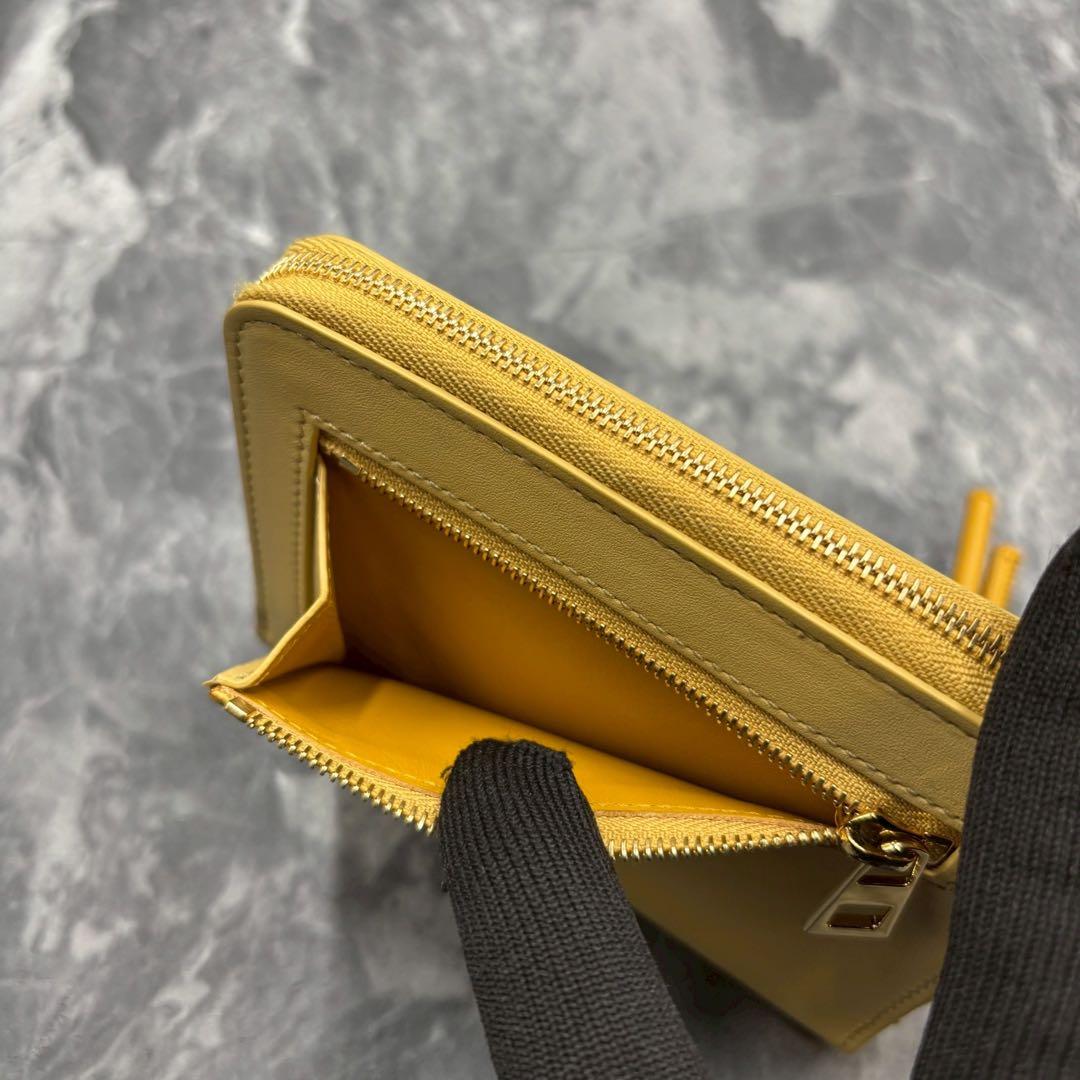 あらいぐま✨LOEWE ノット コンパクトウォレット イエローベージュ 財