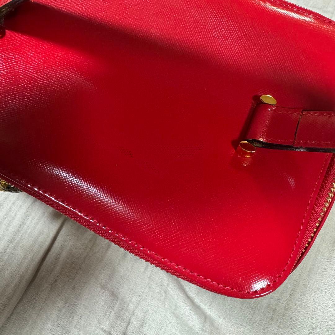 美品 VERSACE レザー バニティバッグ 赤　ファスナー チャーム 太陽