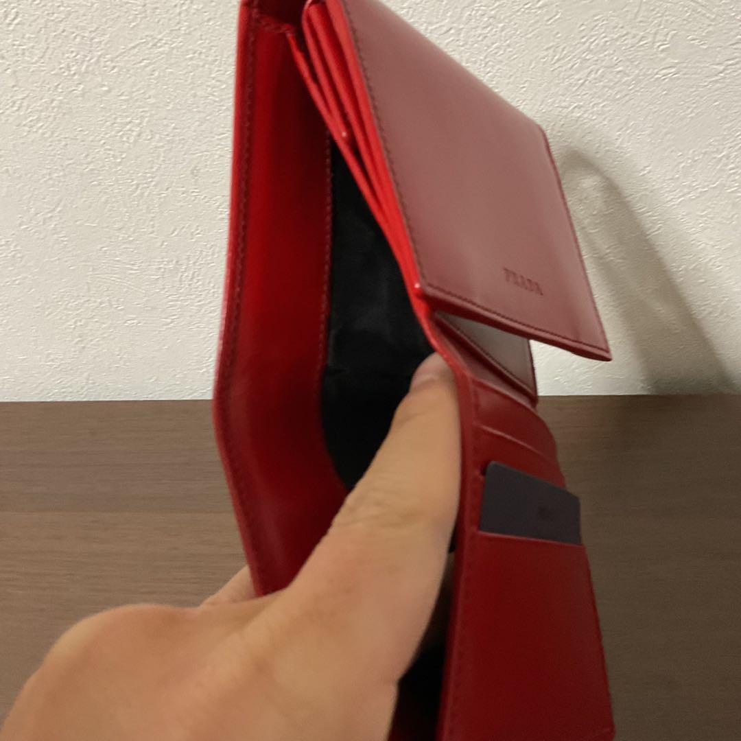 Mio 新品未使用 美品 プラダ レザー ロゴエンボス 折り財布
