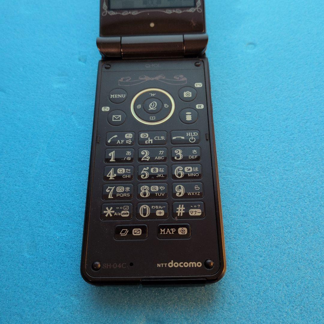 Q-pot. Phone SH-04C docomo チョコレートビスケット