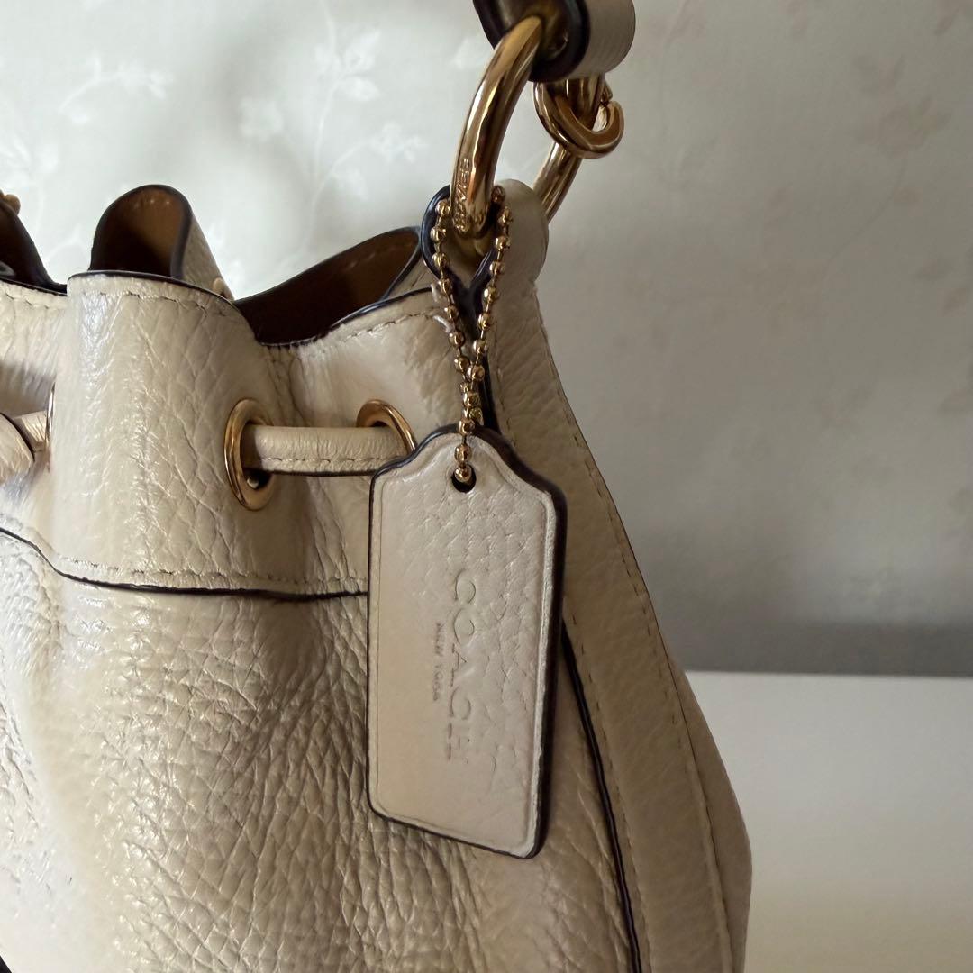 コーチ デンプシー ショルダーバッグ 巾着 2way レザー アイボリー