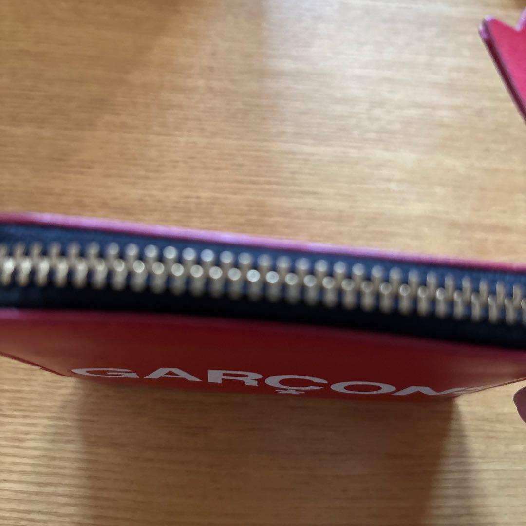 COMME des GARCONS ロゴ入りケース