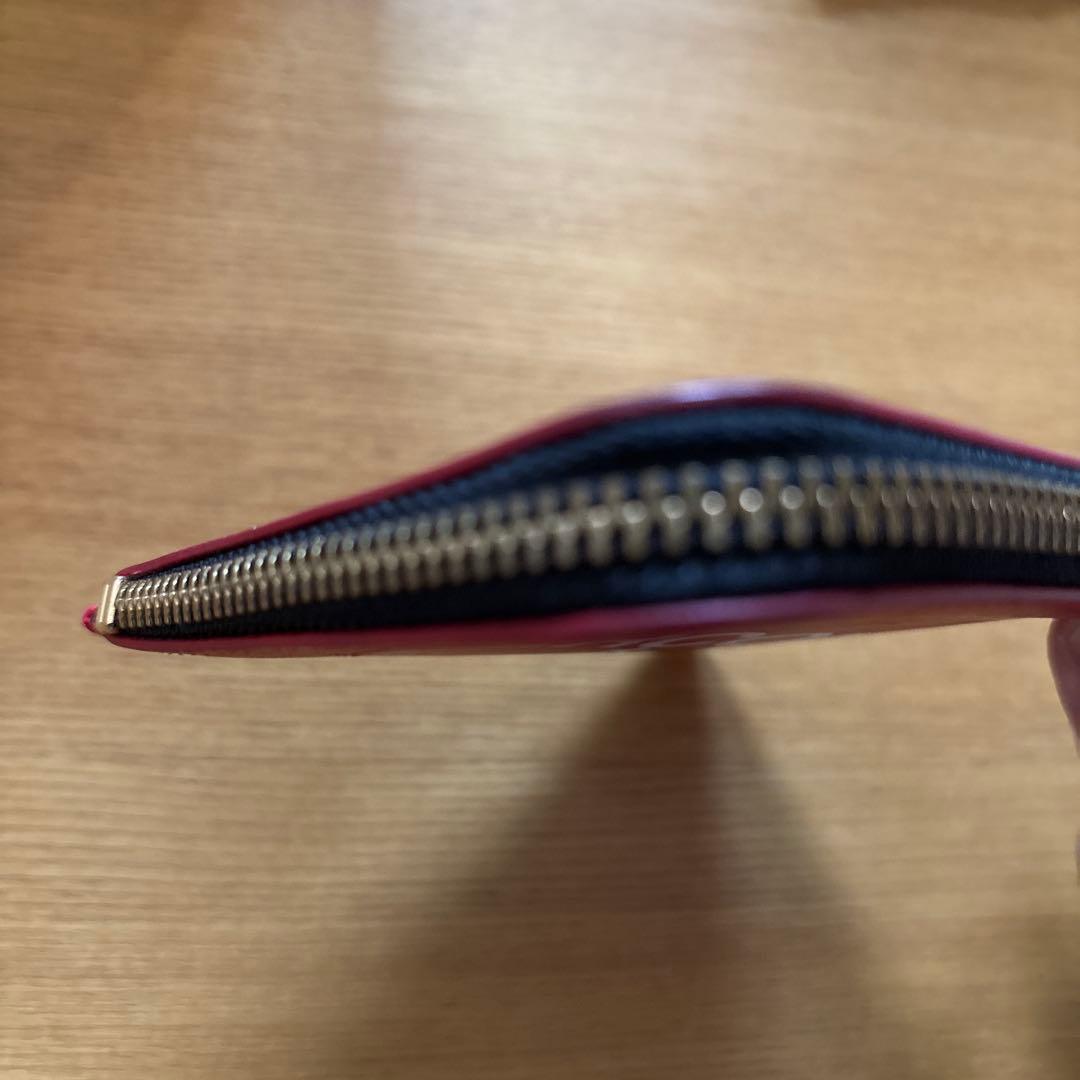 COMME des GARCONS ロゴ入りケース