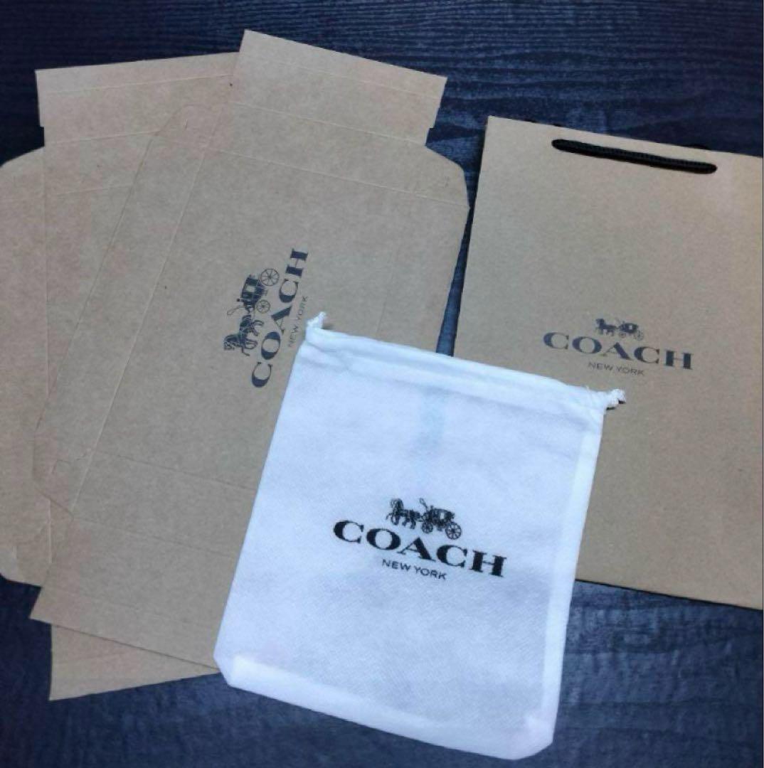 ✨️新品未使用✨COACH ブラック 二つ折り財布