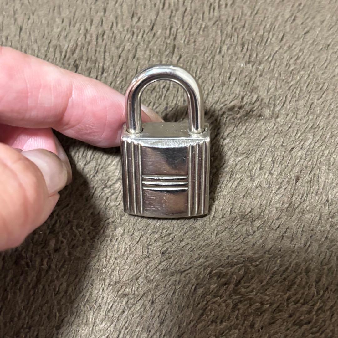 Hermèsエルメスエールラインリュックシルバーカデナ南京錠。鍵なし