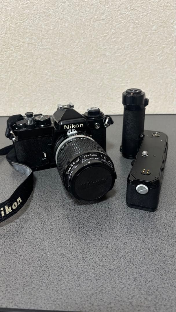 一眼レフカメラNikon FE 43-86mmレンズ付き　。モータードライブ。