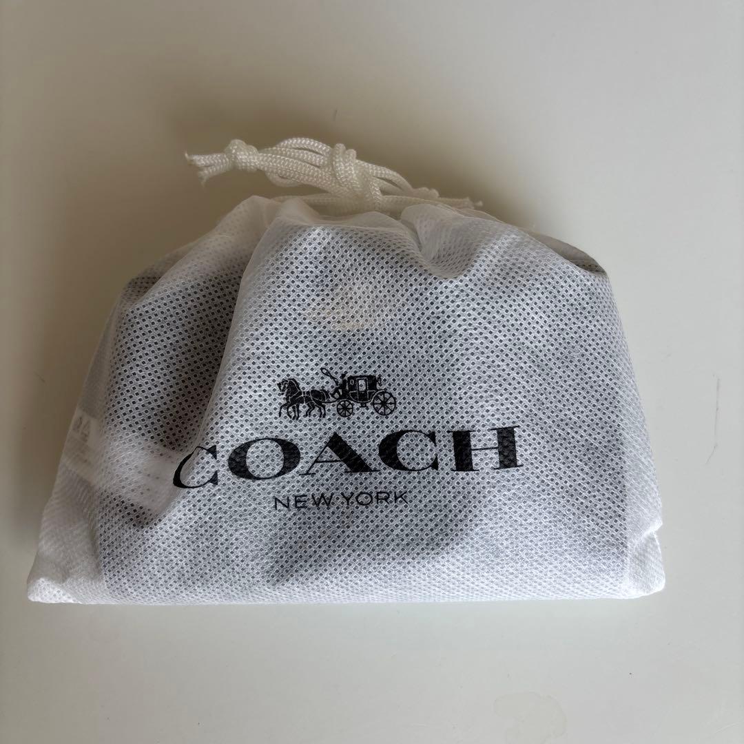 【新品未使用】保存袋付COACHコーチ二つ折り財布 シグネチャー ダークブラウン