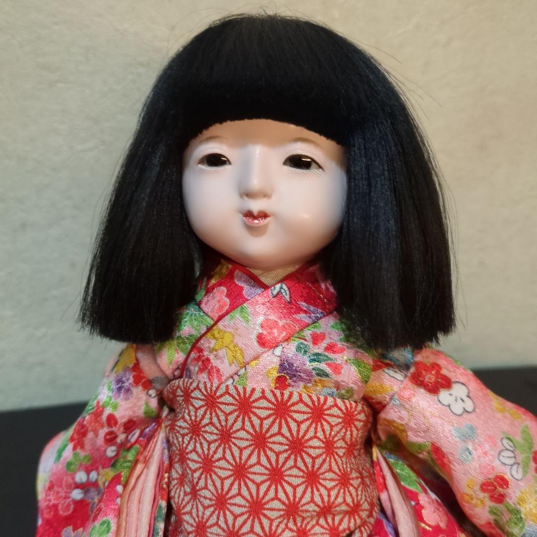 味岡映水作　5号　市松人　赤とピンクの着物