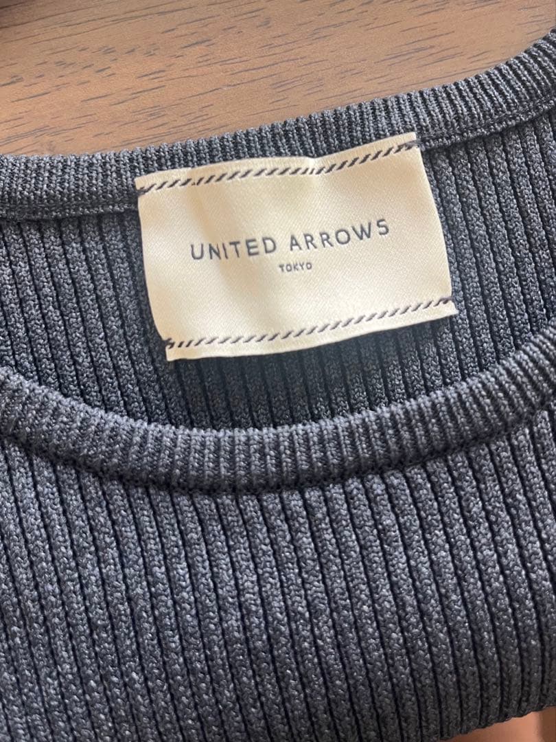 UNITED ARROWS　リボンペプラムニット　ダークグレー