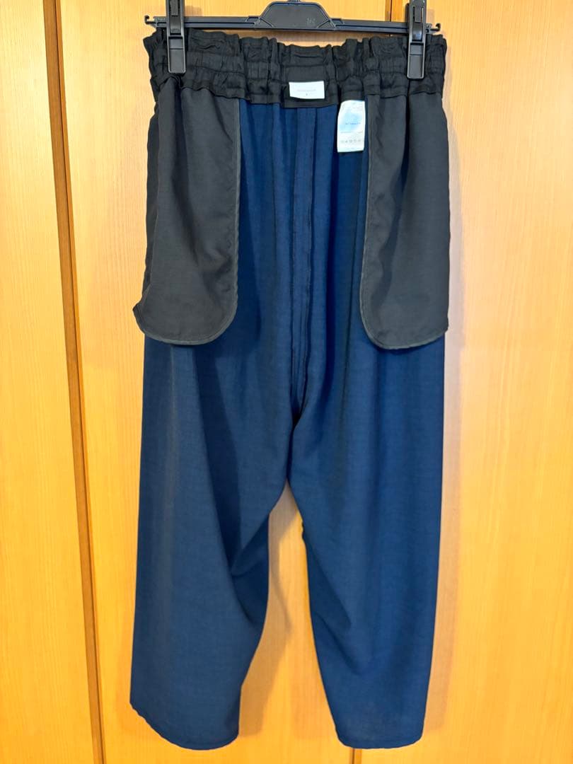 NO CONTROL AIR スパンポリエステルドレープカルゼ テーパードパンツ