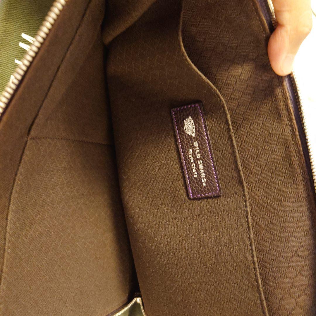 ワイルドスワンズ フォセット クラッチバッグ 王冠ロゴ パープル