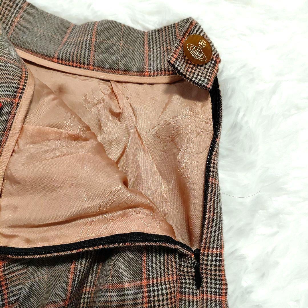 ヴィヴィアン　スカート　ウール　プリーツ チェック　オーヴボタン　裏地ロゴ　L