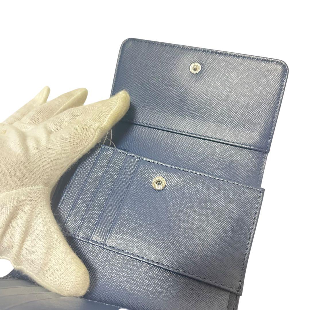 新品　ToryBurch 三つ折り財布パンチングレザー 花柄カットワーク