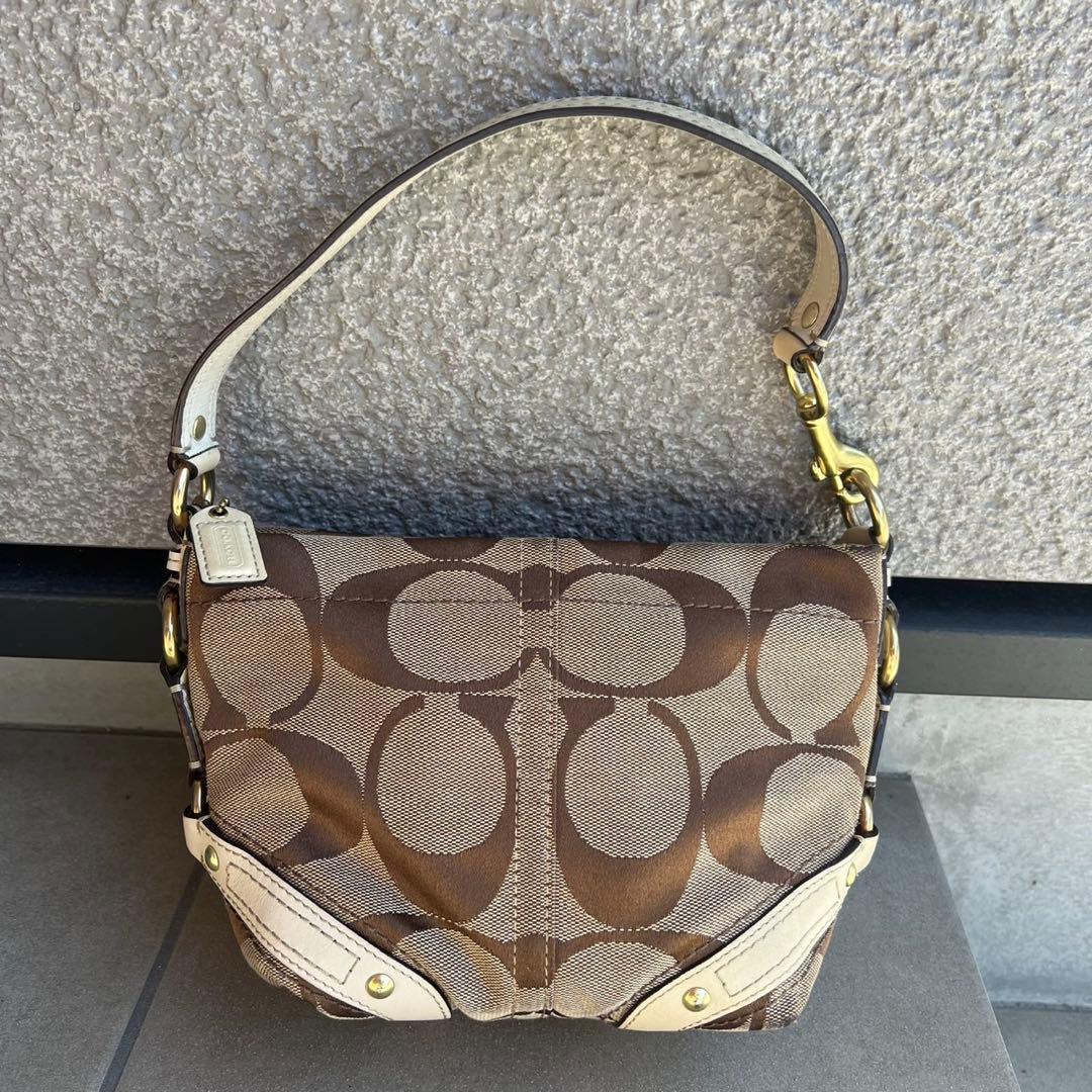 バッグ Coach accessory pouch bag Signature stud