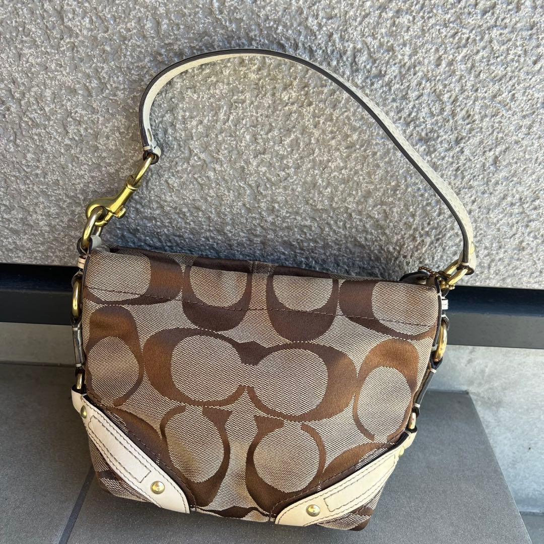 バッグ Coach accessory pouch bag Signature stud