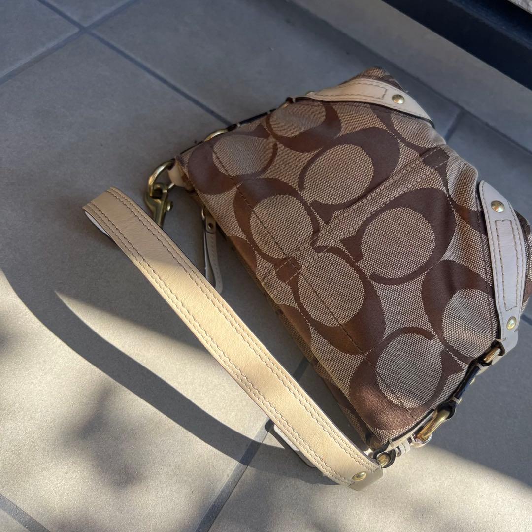 バッグ Coach accessory pouch bag Signature stud