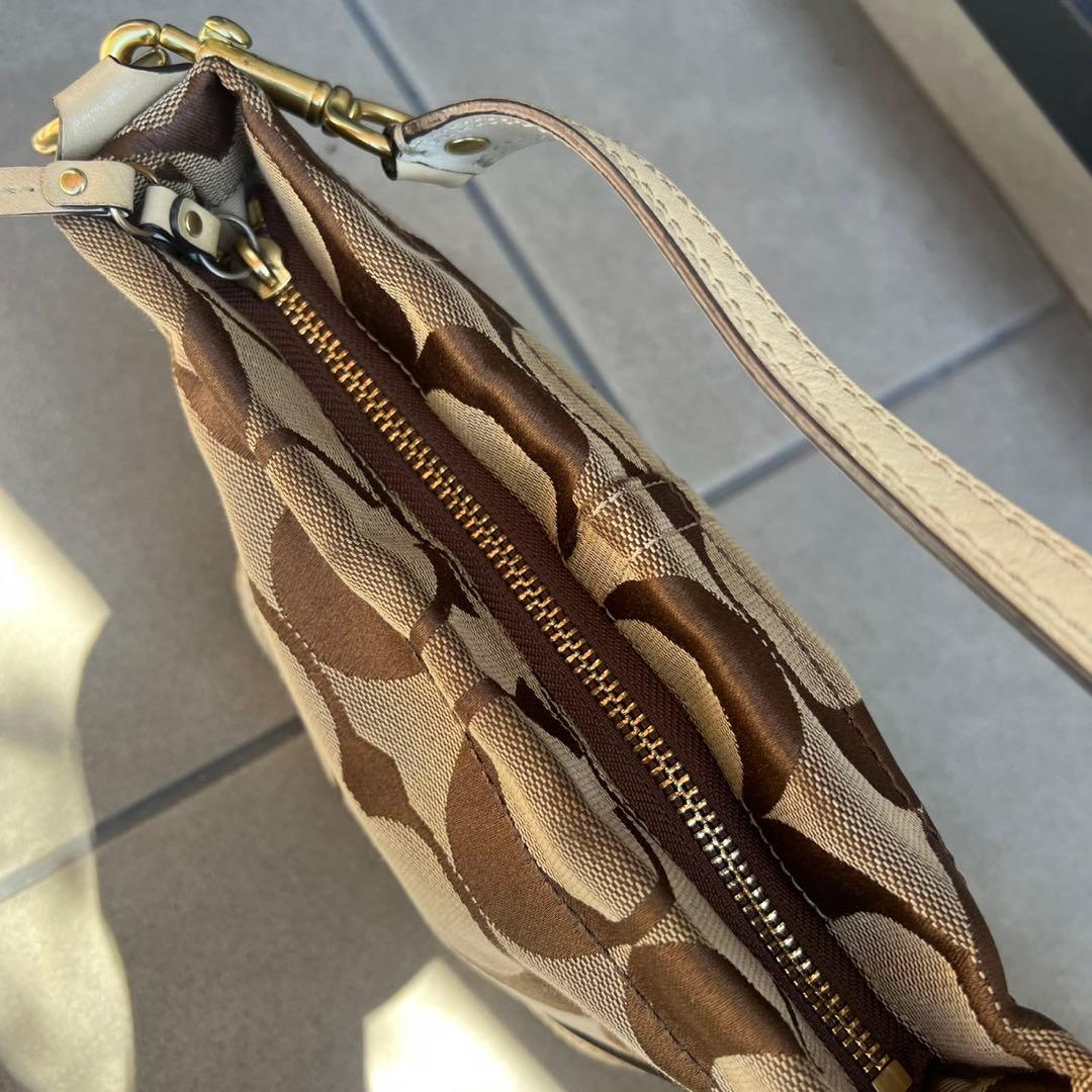 バッグ Coach accessory pouch bag Signature stud