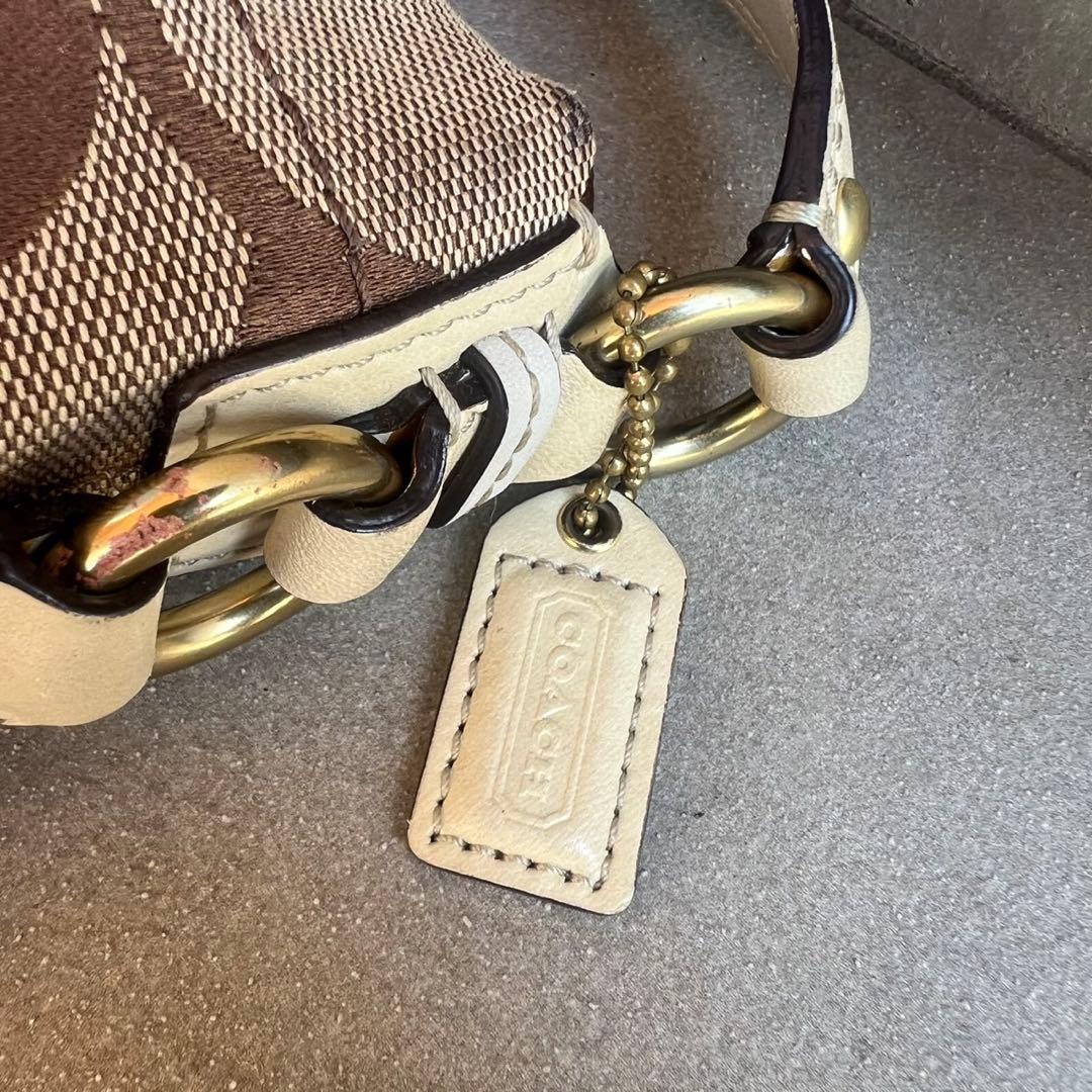 バッグ Coach accessory pouch bag Signature stud