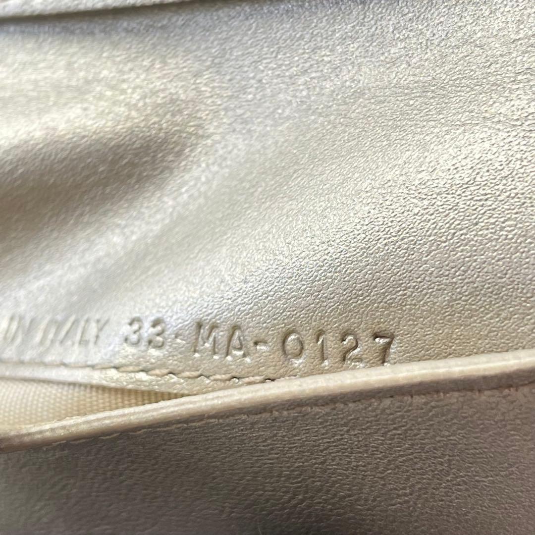 【美品】クリスチャンディオール 二つ折り財布 カナージュ ロゴ金具 レザー