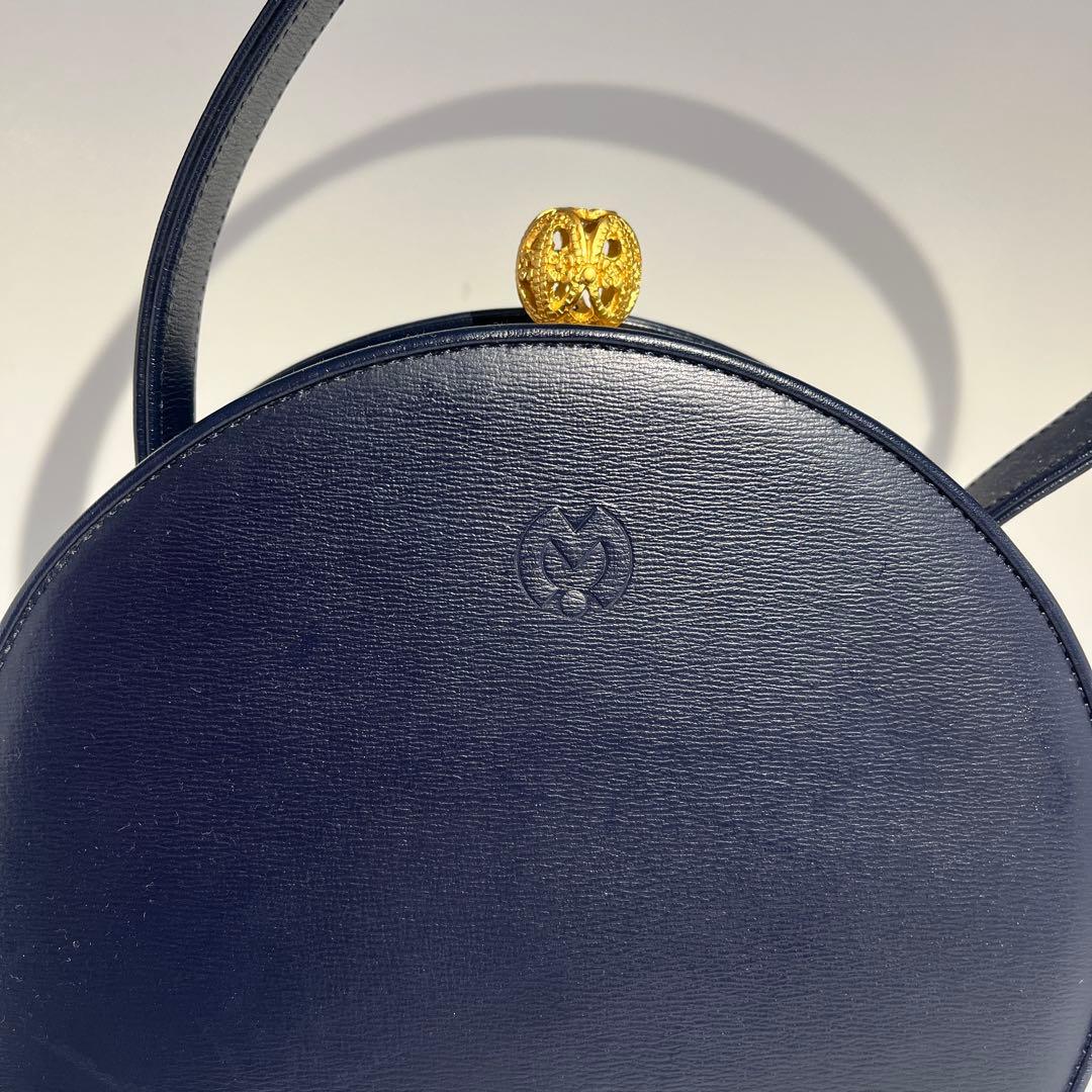 Mila schon ミラショーン 丸型 パーティーバッグ レザー 巾着