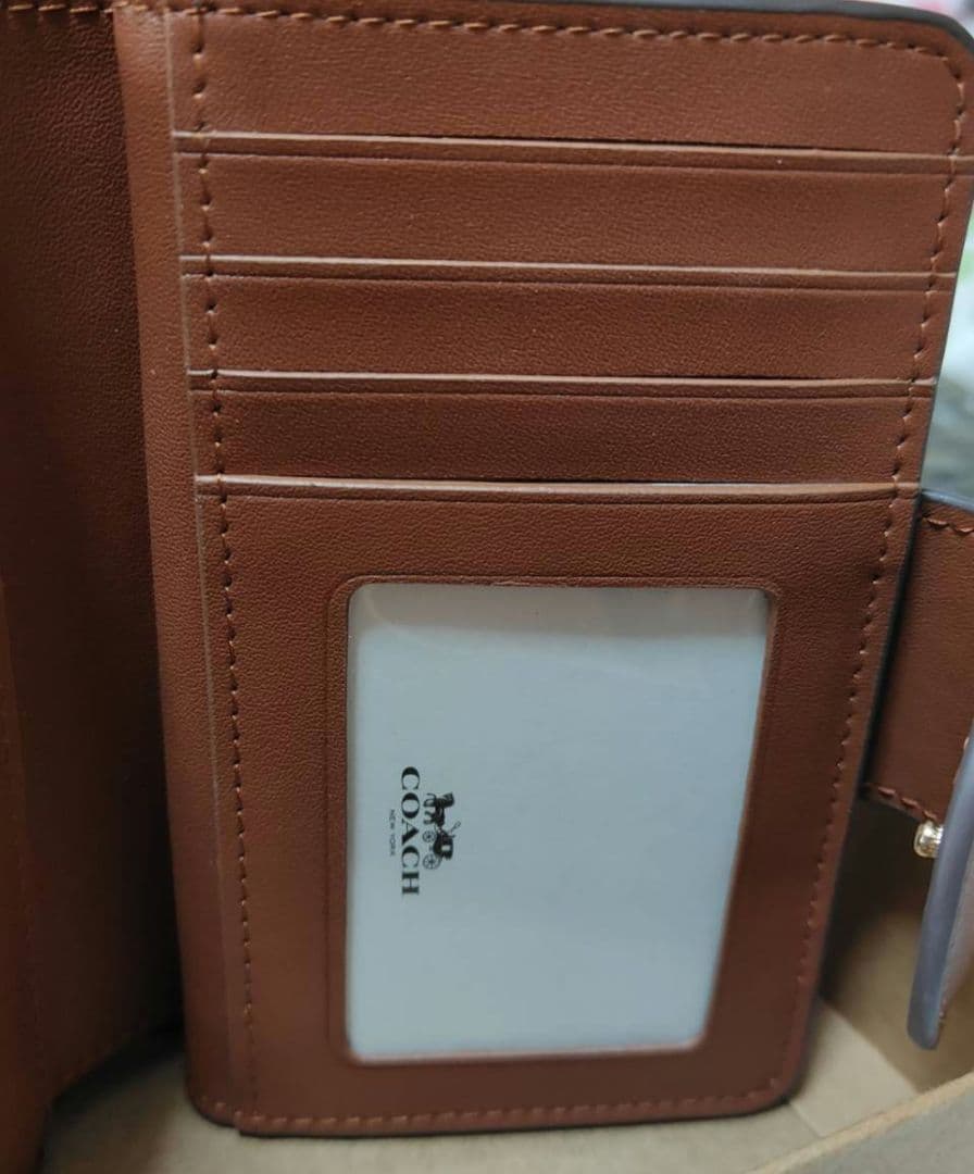 新品未使用 COACH 二つ折り財布 アウトレット品 シグネチャー 定番