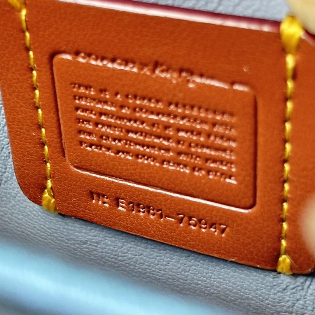 コーチ　水原希子　がま口　小銭入れ　財布　メタリックブルー　75947