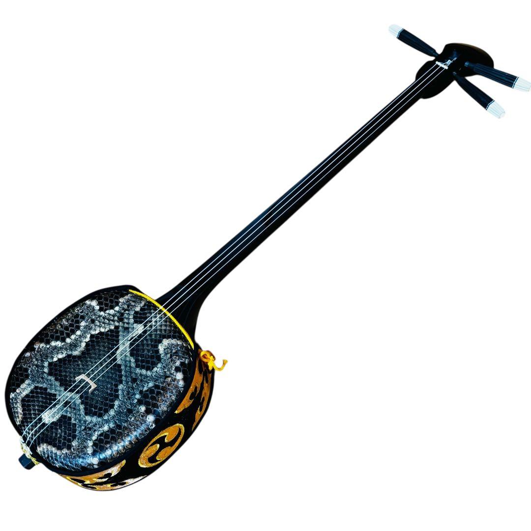 三線 蛇皮調 真壁型 黒塗り棹 ケース付き（付属品あり）