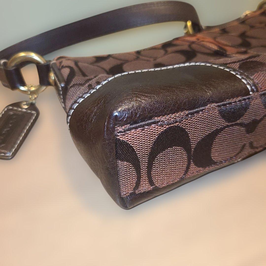 コーチ アクセサリーポーチ ワンショルダーバッグ シグネチャー ターンロック 茶