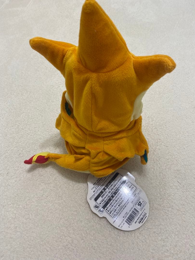 【タグ付き】ポケセン限定 ピカチュウポンチョを着たぬいぐるみ(メガリザードンY)