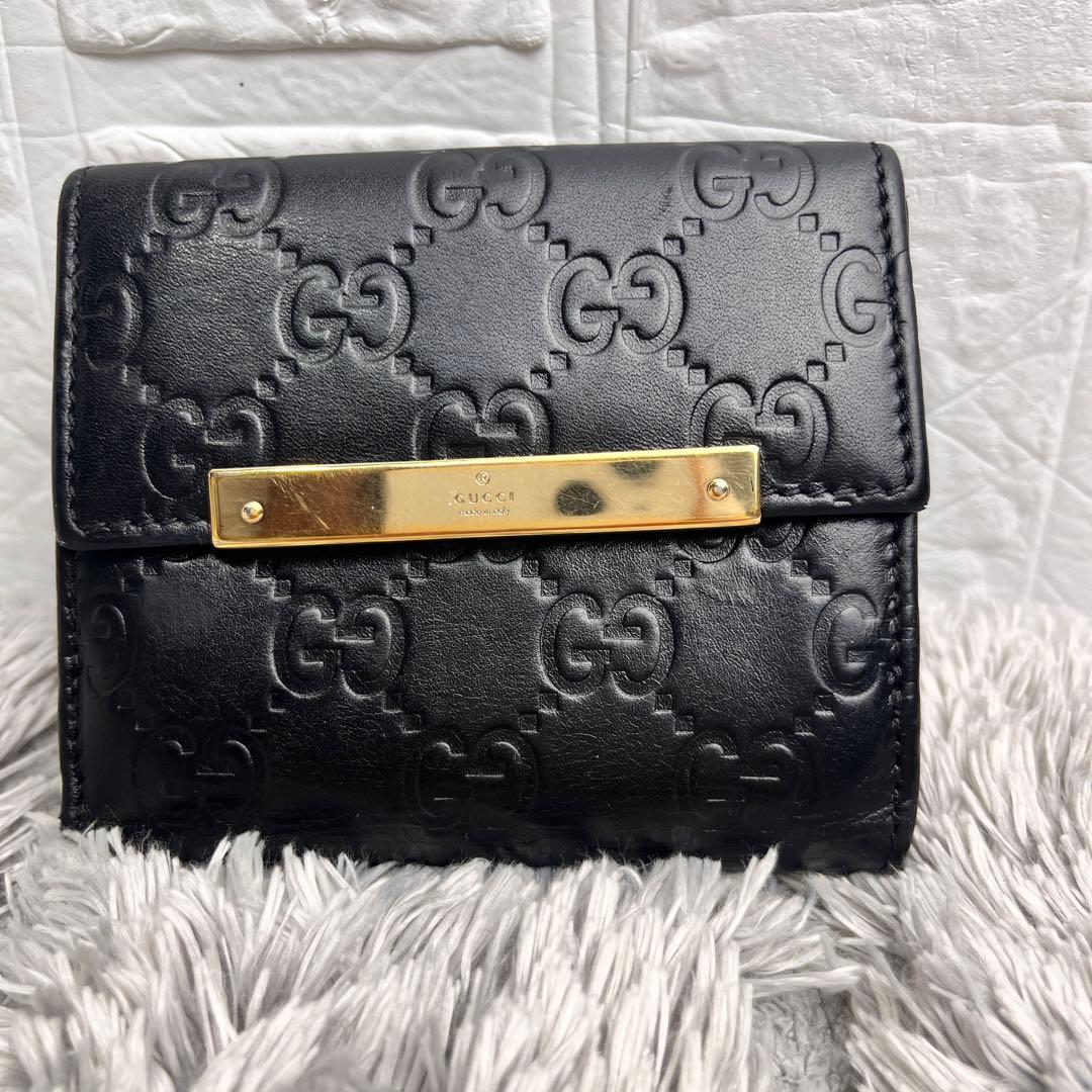 グッチ　シマ　折り財布　ロゴプレート　ブラック　　メンズ　レディース