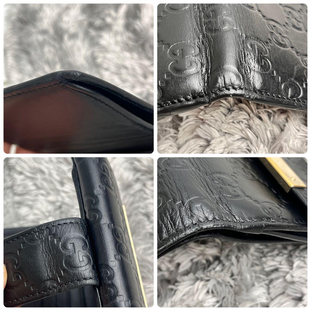 グッチ　シマ　折り財布　ロゴプレート　ブラック　　メンズ　レディース